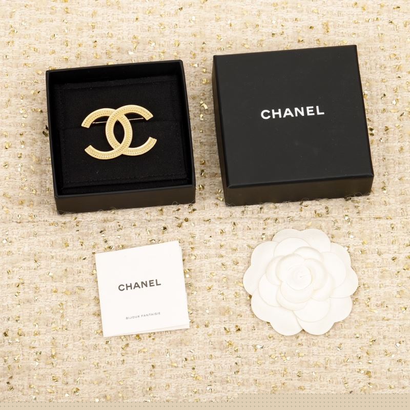 Ch*el brooches